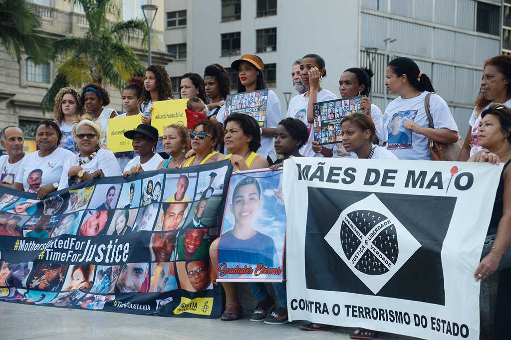 Photo of mothers and relatives of young Black men protesting against police violence in Brazil